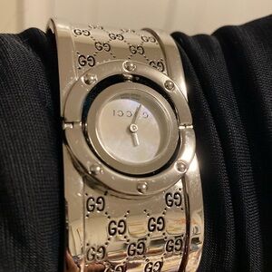 Authentic  Superb! Gucci stainless steel twirl Mother of pearl watch/ bracelet.